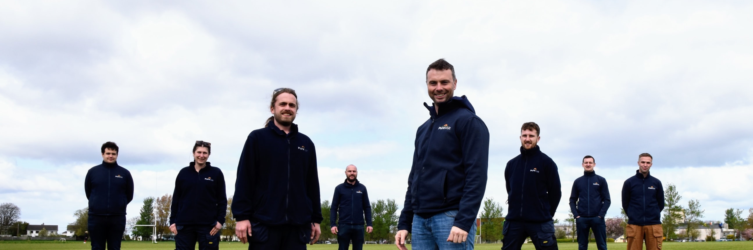 The PreVolt Solar Team holding a solar panel