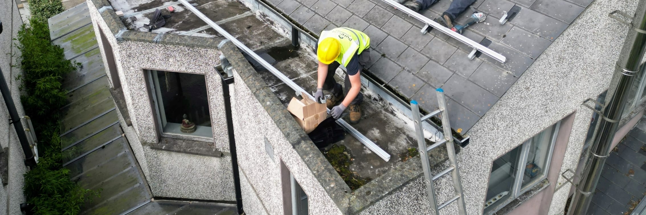 Solar Panel Installers on Roof