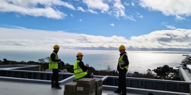 PureVolt Solar Team on a flat roof